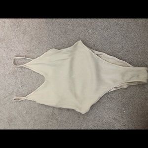 Out from under body suit